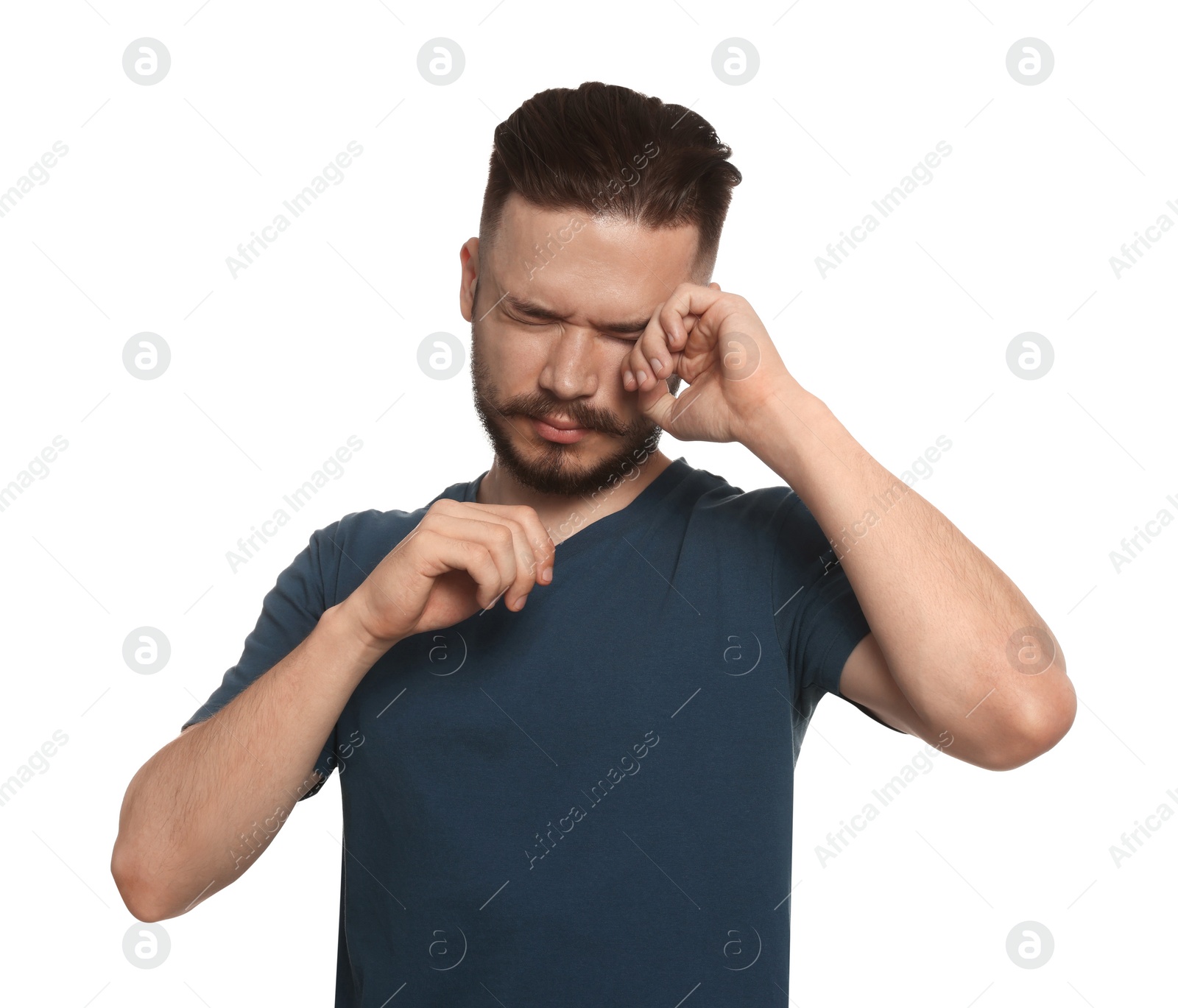 Photo of Young man suffering from eyestrain on white background