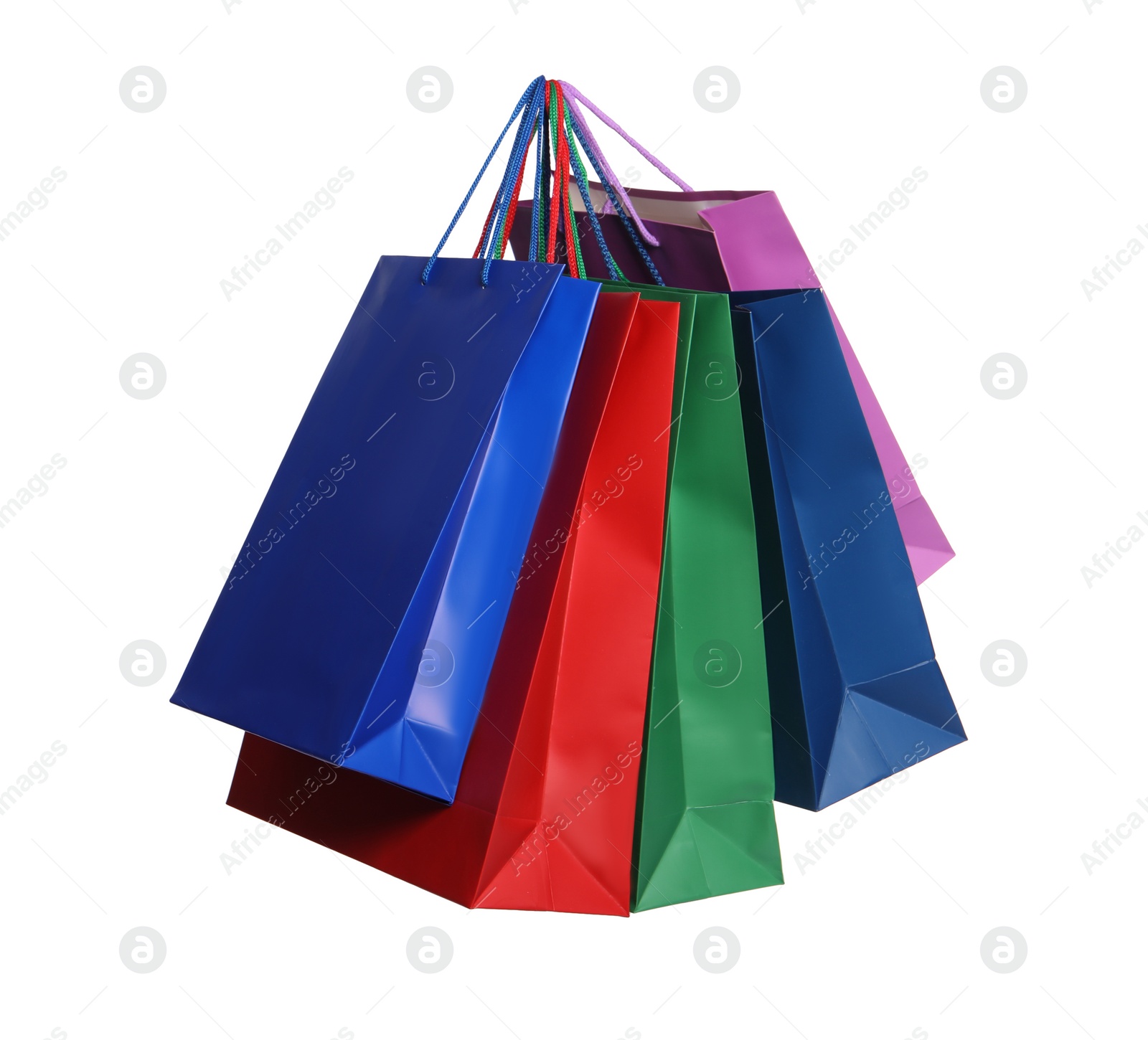 Photo of Colorful paper shopping bags isolated on white