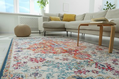 Photo of Stylish living room with beautiful carpet and furniture, closeup. Interior design