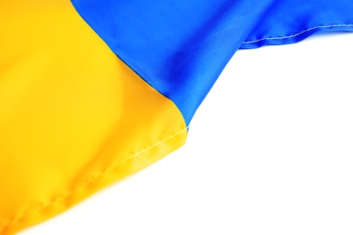 Photo of National flag of Ukraine on white background, top view