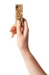 Woman holding grain cereal bar on white background. Healthy snack