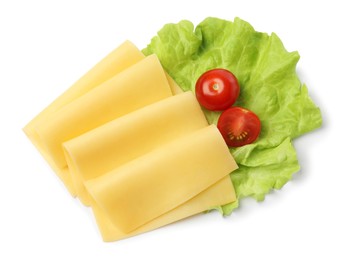 Slices of tasty fresh cheese, tomatoes and lettuce isolated on white, top view