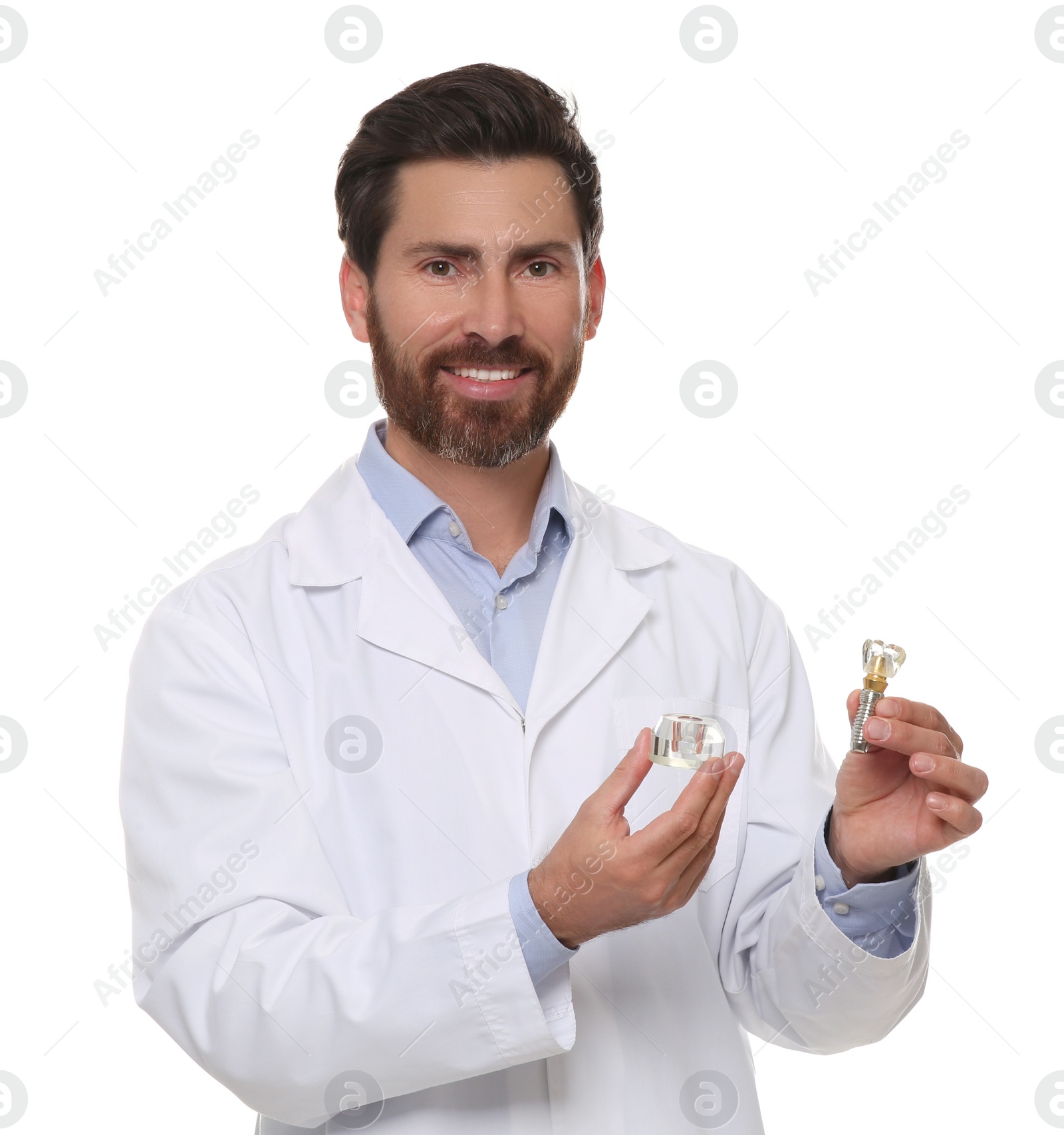 Photo of Dentist holding educational model of dental implant on white background