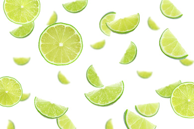 Image of Collage of flying cut limes on white background