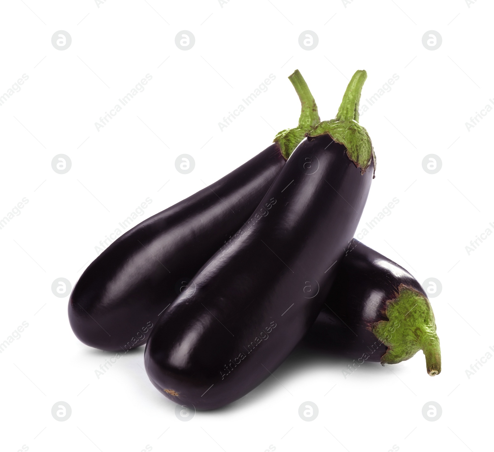 Photo of Tasty raw ripe eggplants on white background