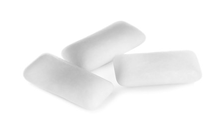 Three chewing gum pieces on white background