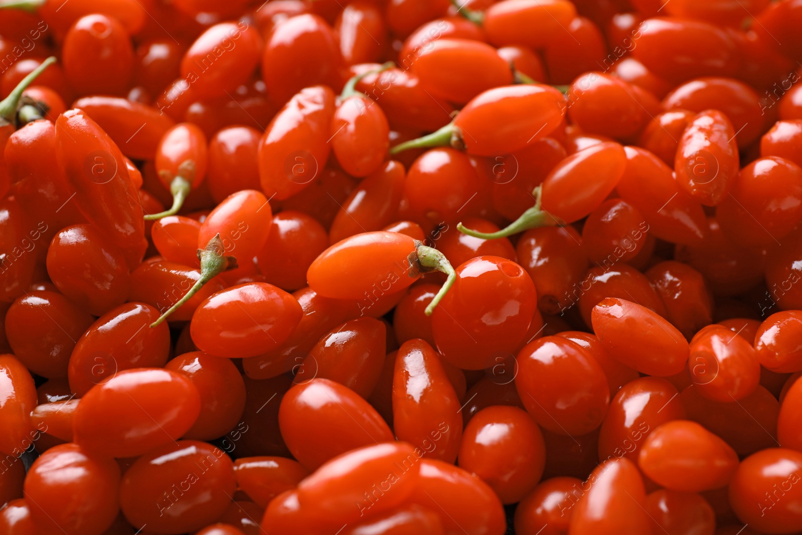 Photo of Fresh ripe goji berries as background, closeup