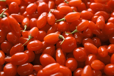 Photo of Fresh ripe goji berries as background, closeup