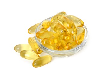 Photo of Vitamin capsules in bowl isolated on white. Health supplement