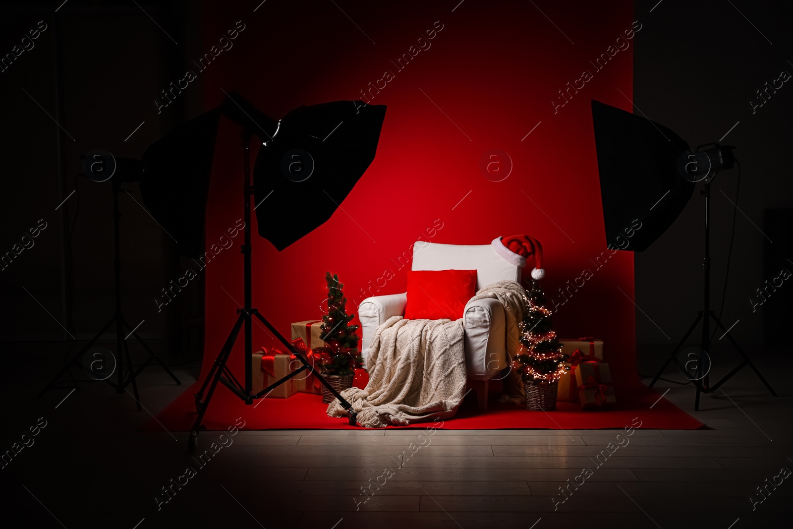 Photo of Beautiful Christmas themed photo zone. Cozy living room interior imitation