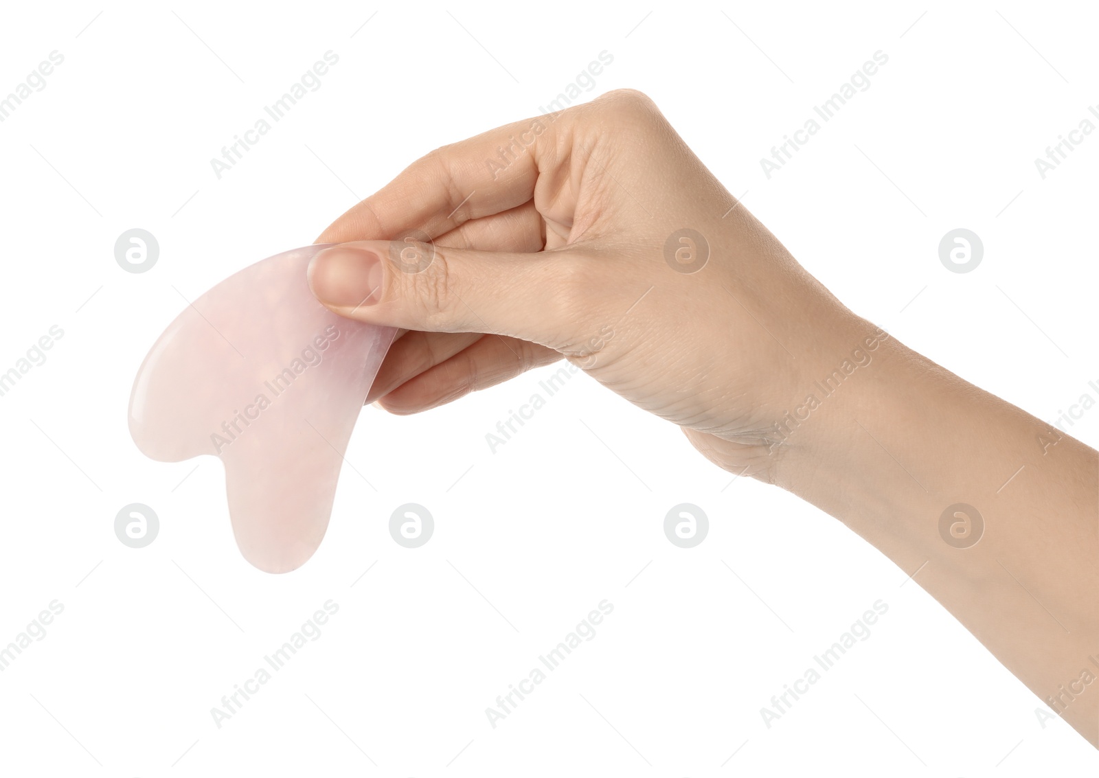 Photo of Woman with rose quartz gua sha tool on white background, closeup