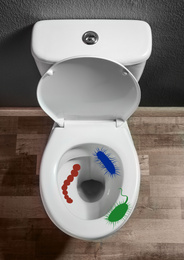 Image of Illustration of microbes on toilet bowl in bathroom, top view 