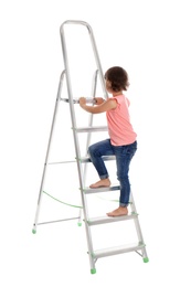 Photo of Little girl climbing up ladder on white background. Danger at home