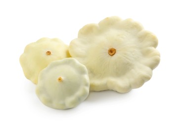 Fresh ripe pattypan squashes on white background