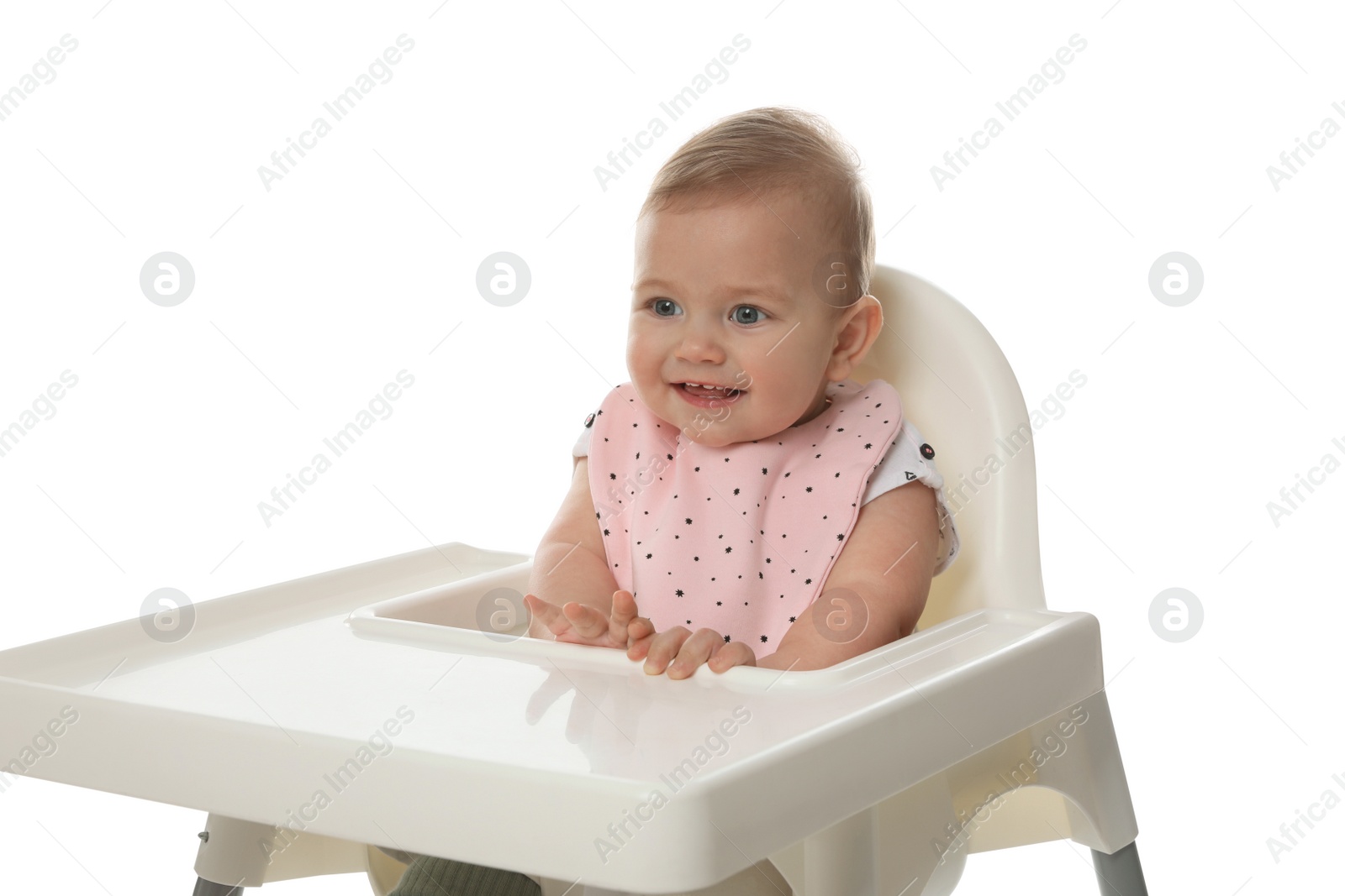 Photo of Cute little baby wearing bib in highchair on white background