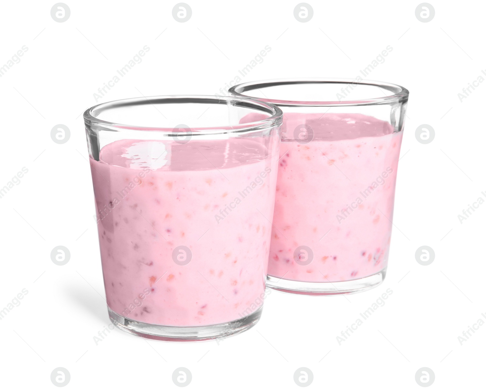 Photo of Tasty fresh raspberry smoothie in glasses on white background