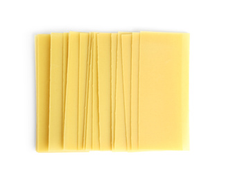 Photo of Uncooked lasagna sheets on white background, top view