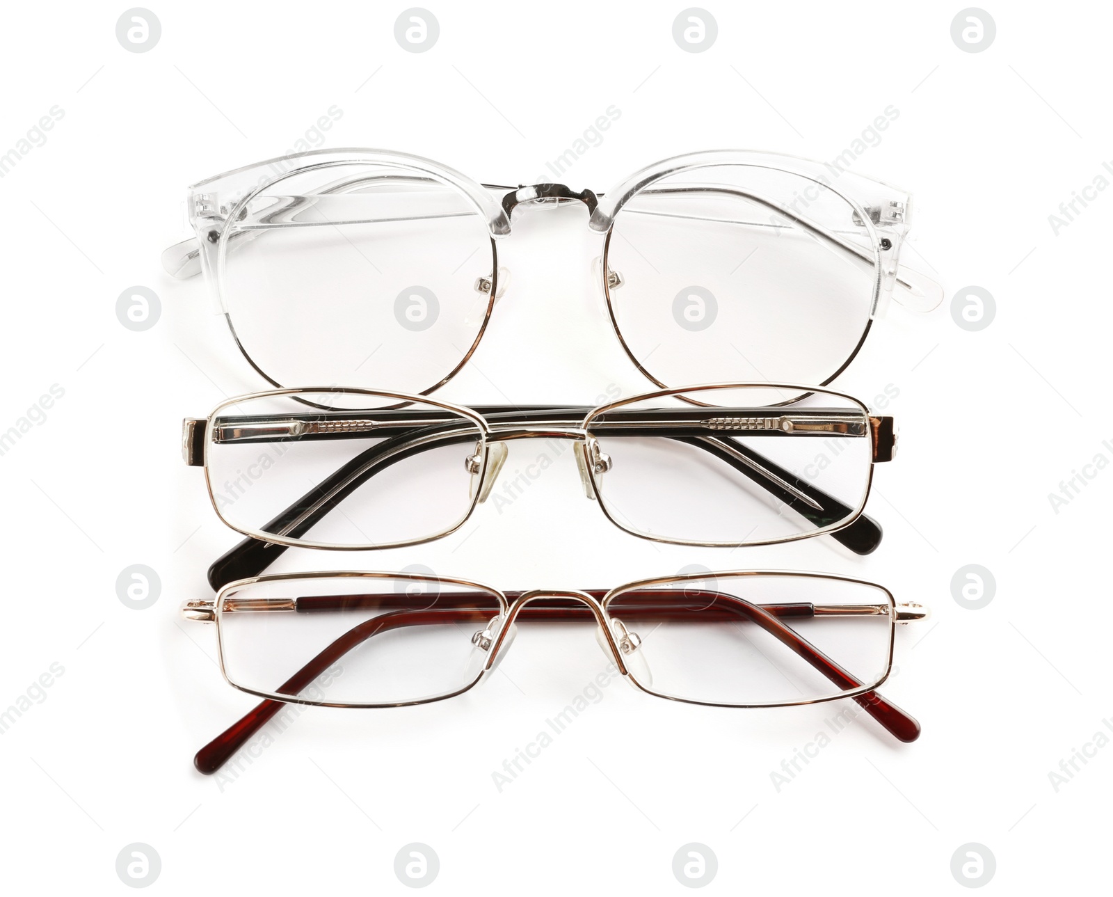 Different glasses with corrective lenses on white background. Vision problem Photo of Different glasses with corrective lenses on white background. Vision problem