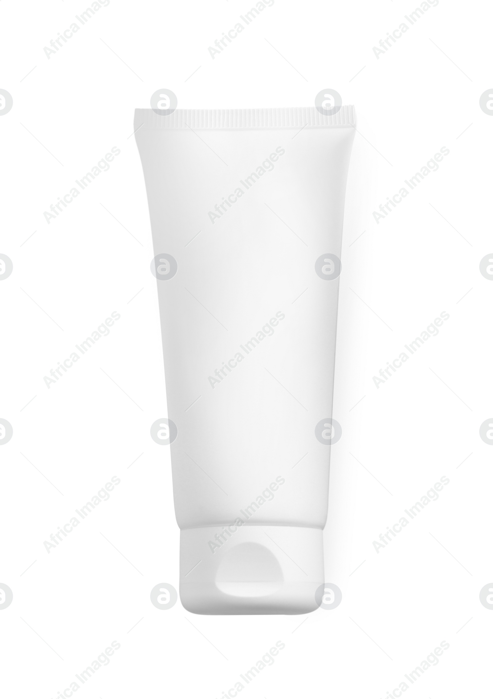 Photo of Tube of hand cream isolated on white, top view