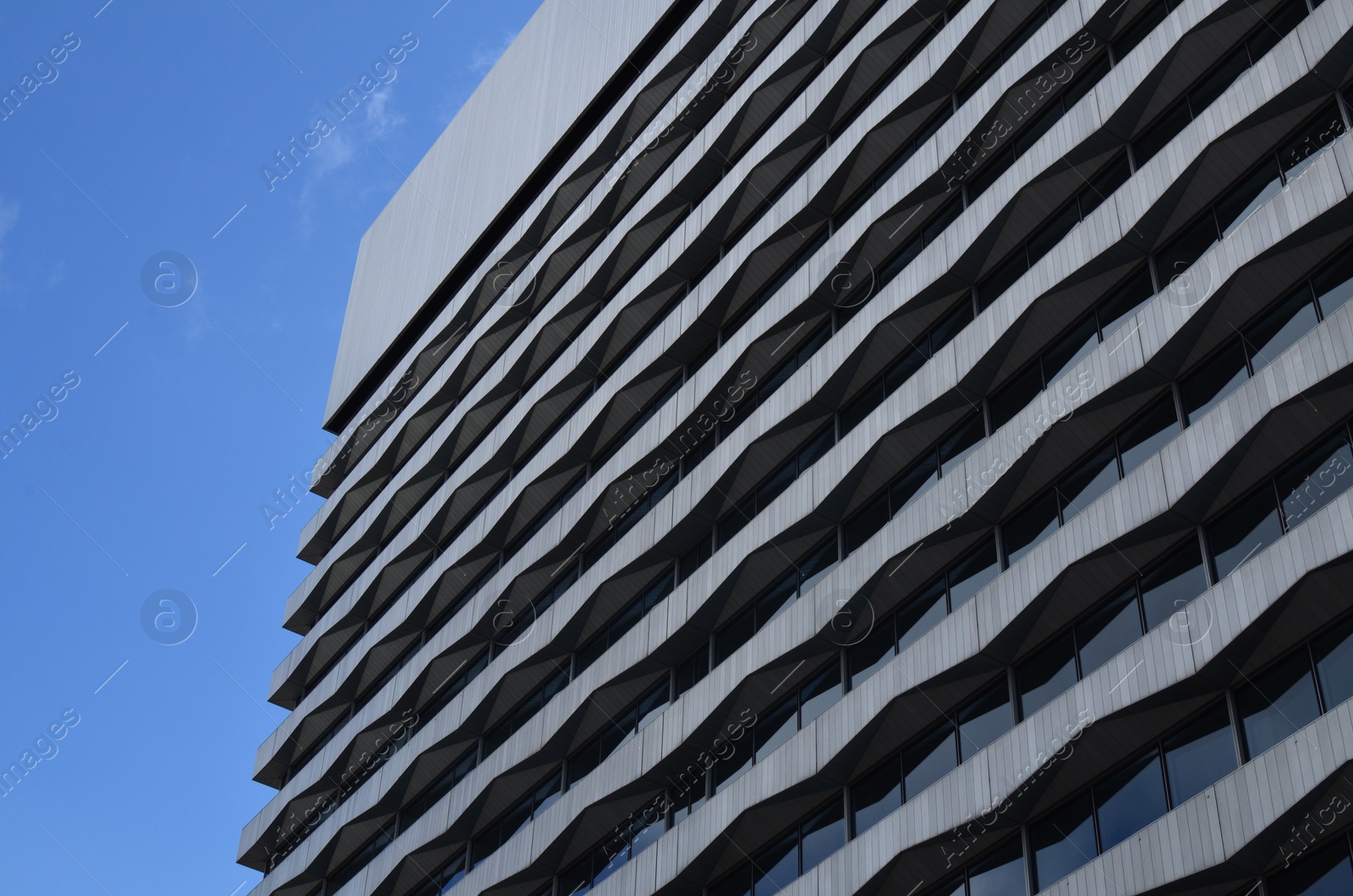 Photo of Exterior of beautiful building against blue sky, low angle view