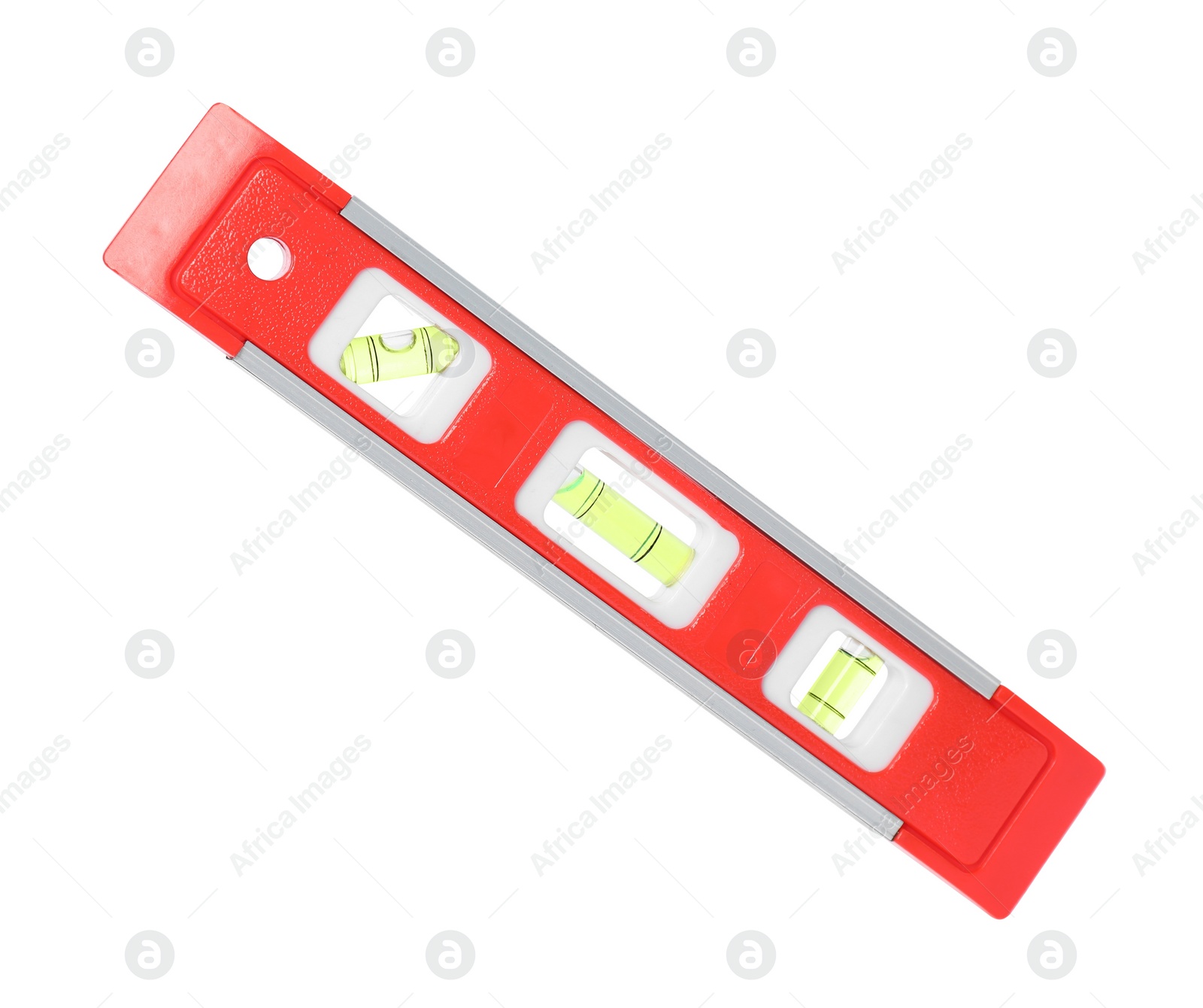 Photo of Red building level isolated on white. Construction tool