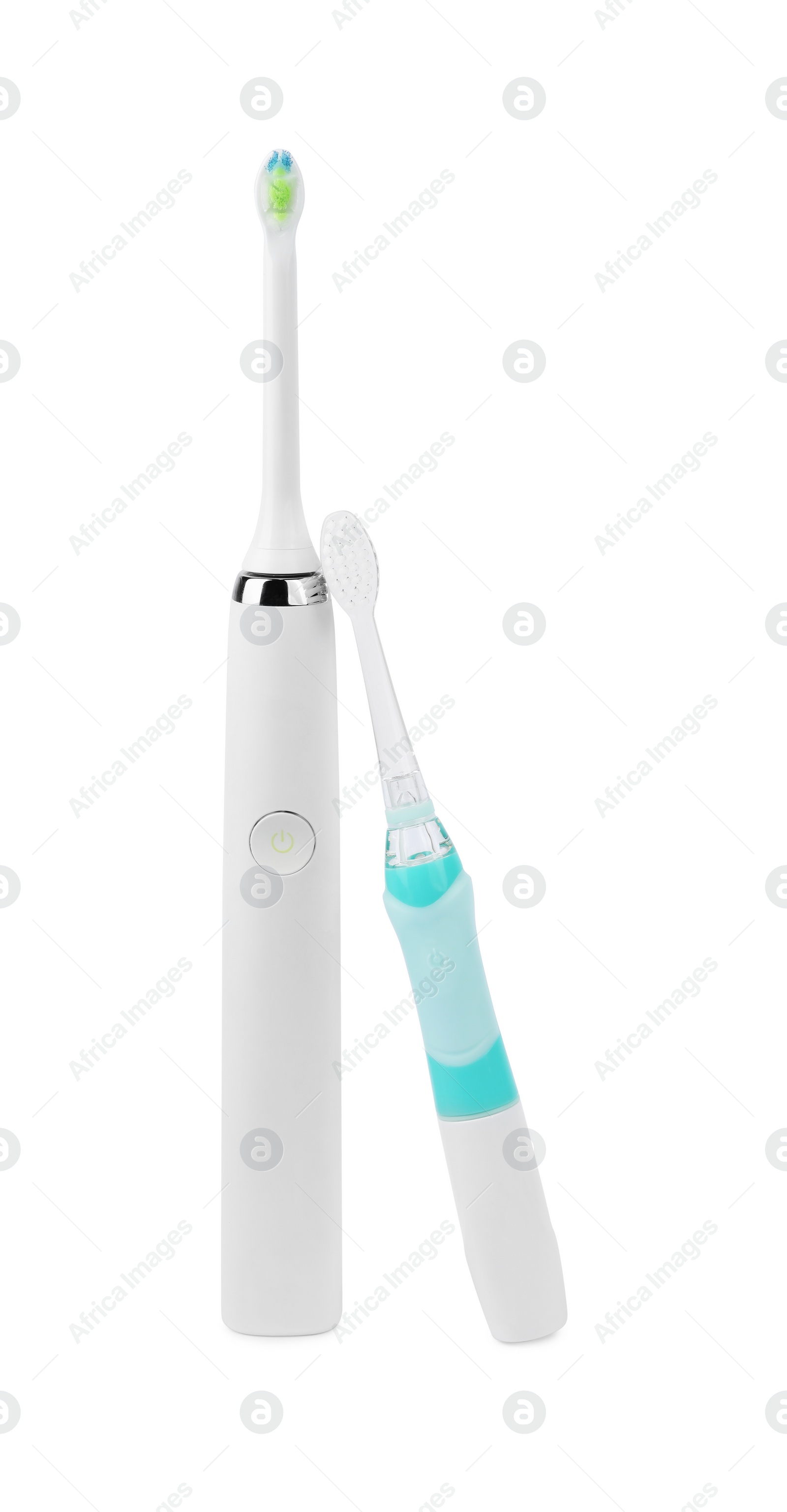 Photo of Electric toothbrushes on white background. Dental care