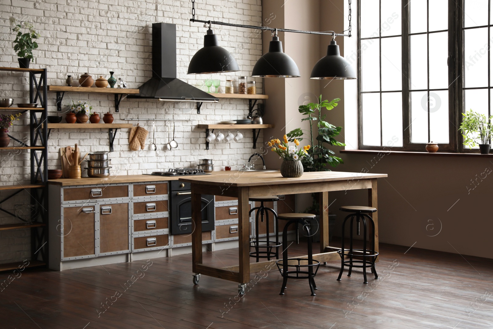 Photo of Beautiful kitchen interior with new stylish furniture