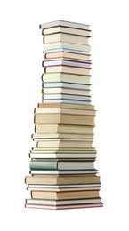 Photo of High stack of many different books isolated on white