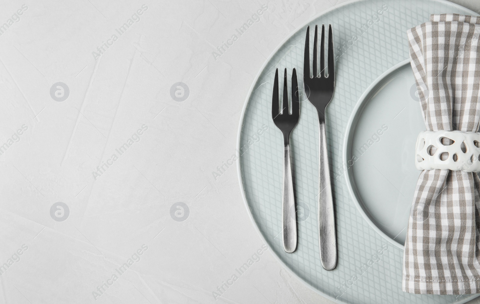 Photo of Beautiful table setting on grey background, top view. Space for text