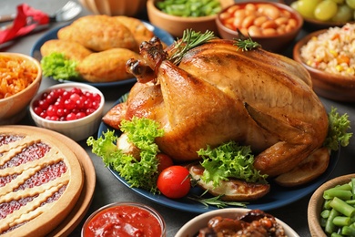 Traditional festive dinner with delicious roasted turkey served on table