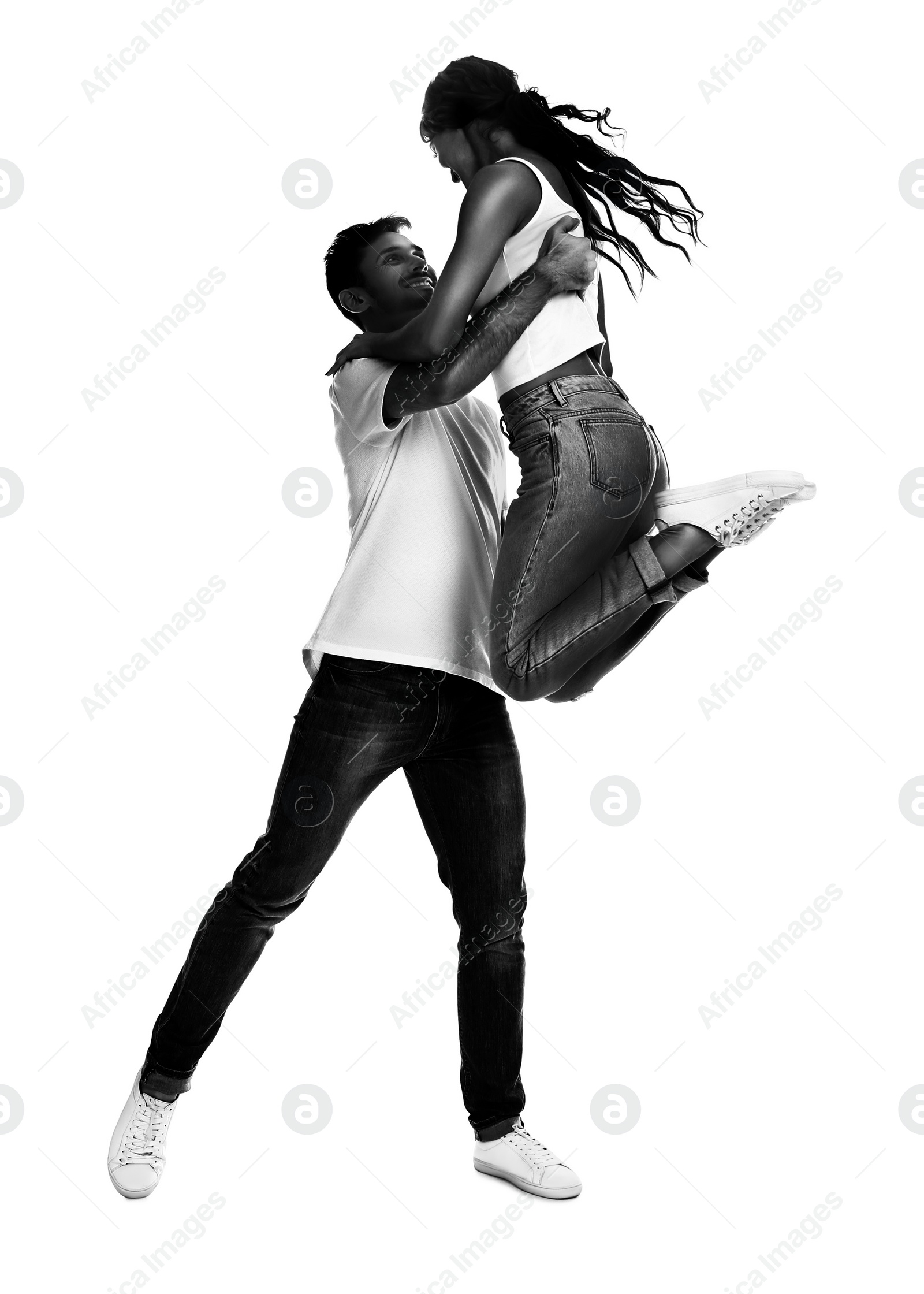 Image of Beautiful young couple dancing on white background