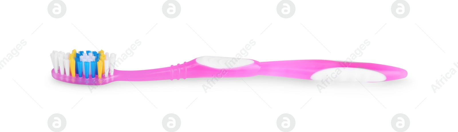 Photo of Pink plastic toothbrush isolated on white. Dental care