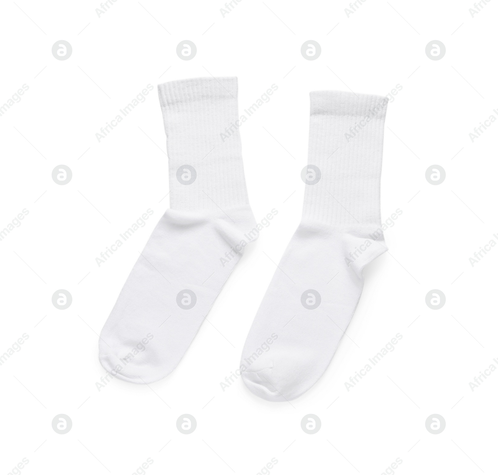 Photo of Pair of stylish clean socks isolated on white, top view