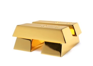 Precious shiny gold bars on white background