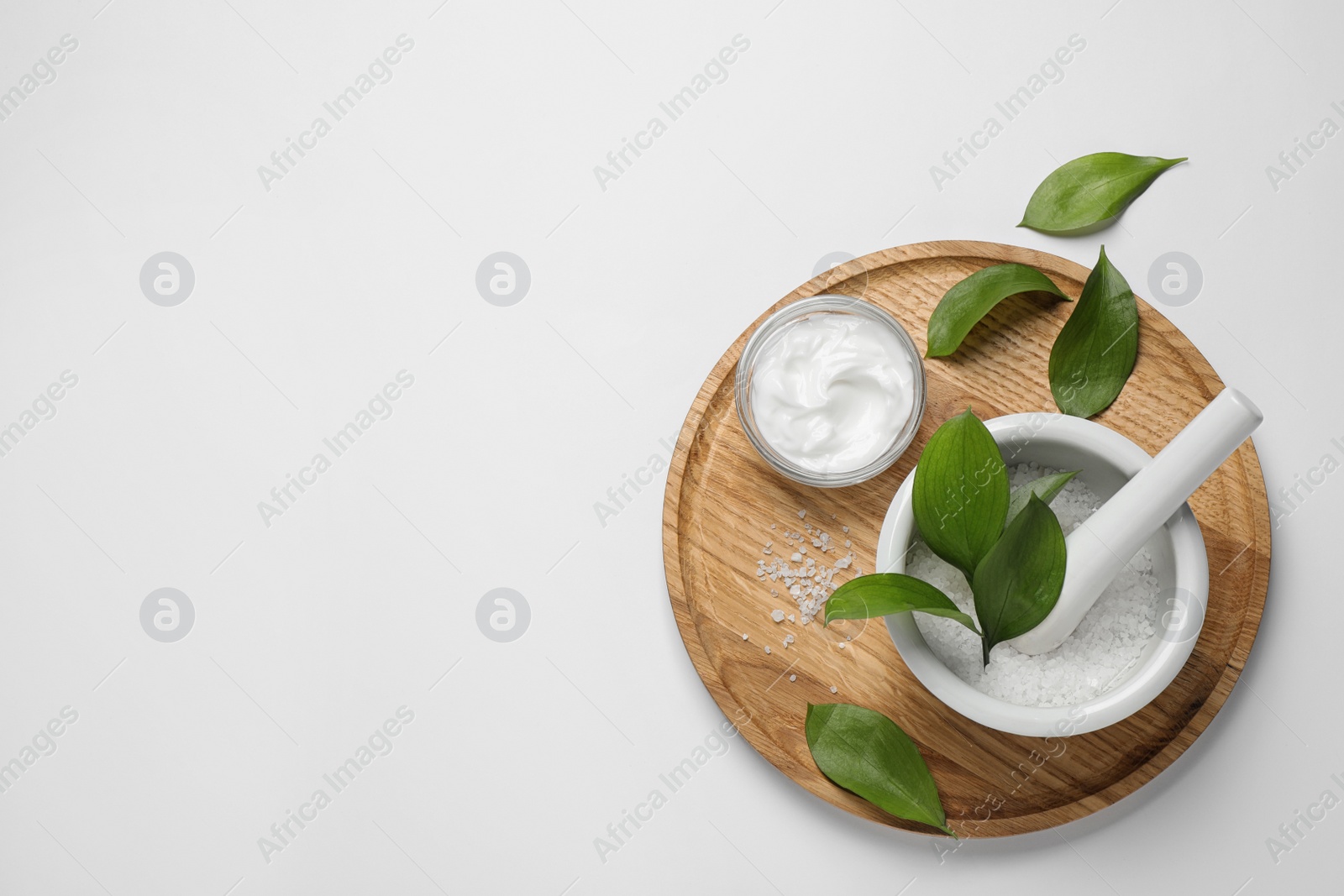 Photo of Composition with bath salt on white background, top view. Spa treatment