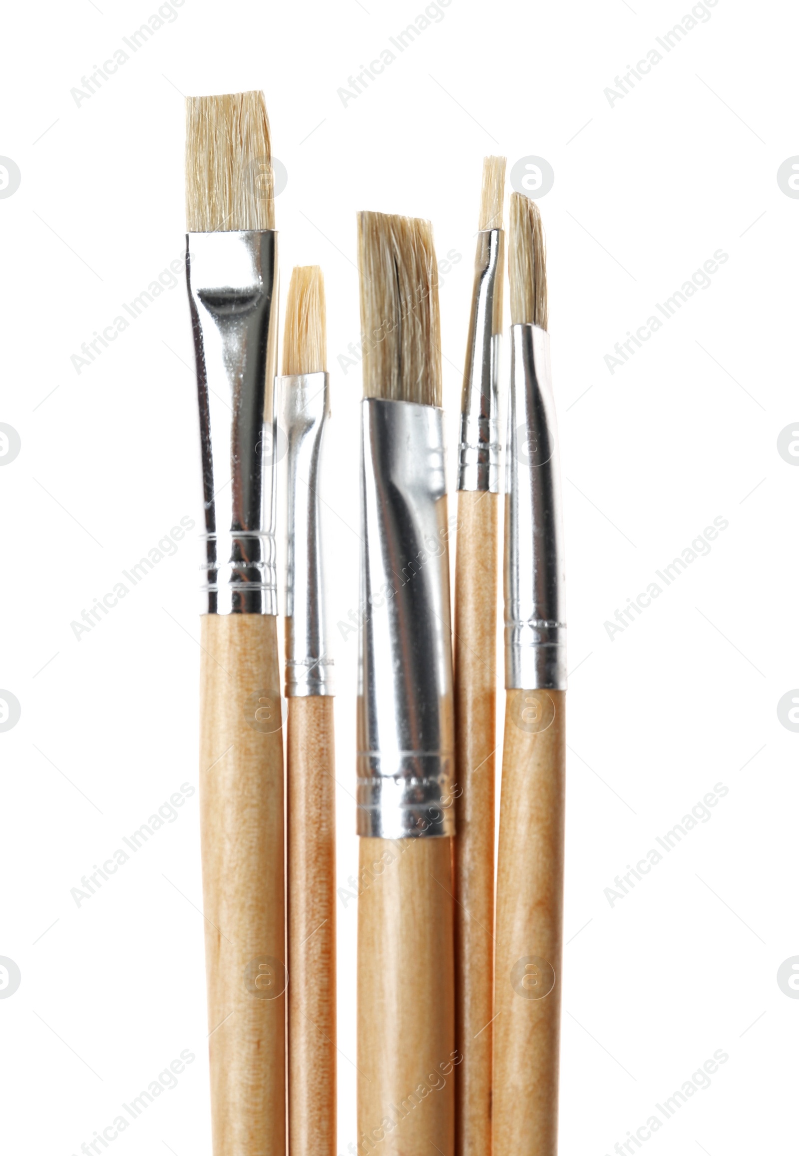 Photo of Set of different paint brushes on white background