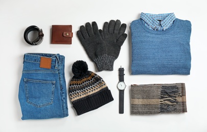 Photo of Flat lay composition with male winter clothes on white background