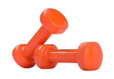 Photo of Orange dumbbells isolated on white. Sports equipment