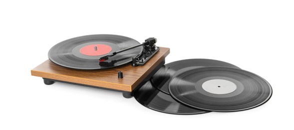 Modern turntable with vinyl records on white background