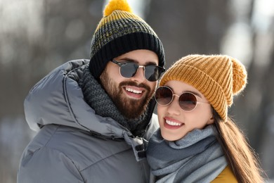 Photo of Beautiful happy couple outdoors on winter day