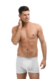 Photo of Handsome man in underwear on white background