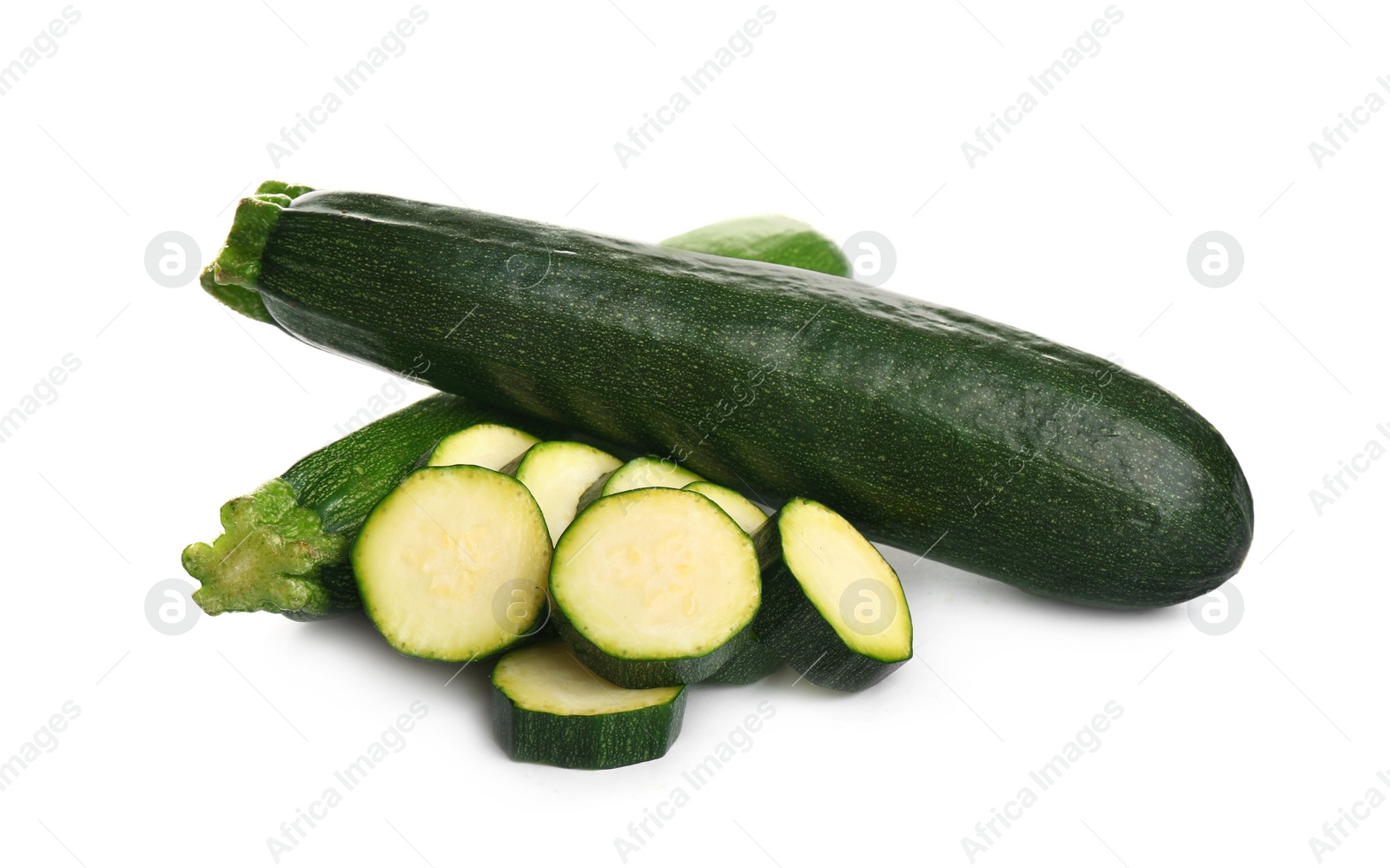 Photo of Fresh ripe green zucchinis isolated on white