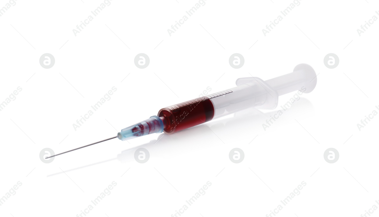 Photo of Plastic syringe with blood isolated on white