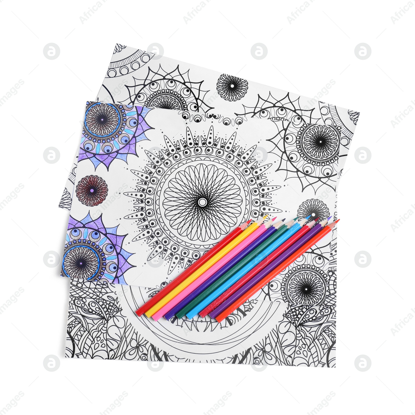 Photo of Antistress coloring pages and pencils on white background, top view