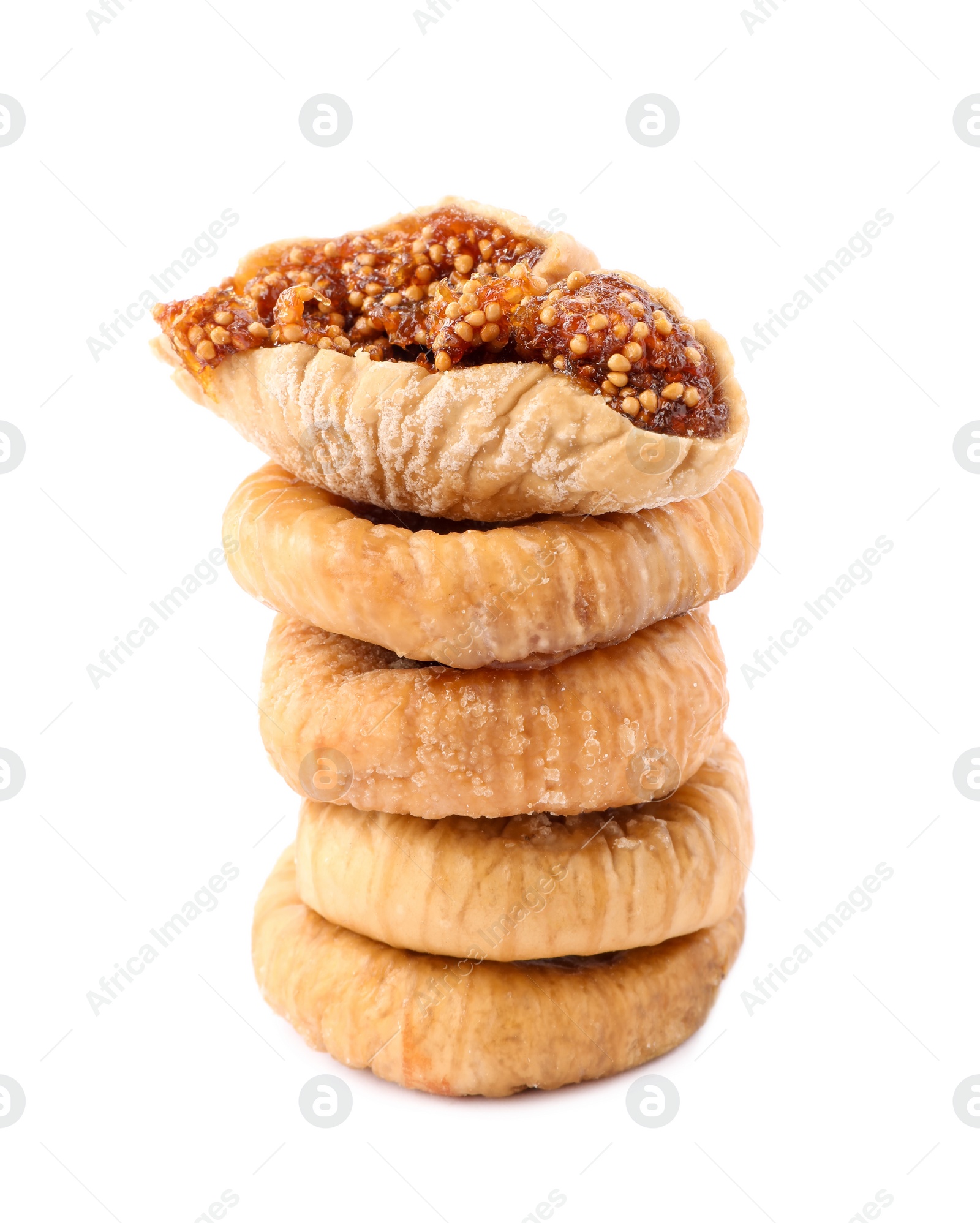 Photo of Stacked tasty dried figs isolated on white