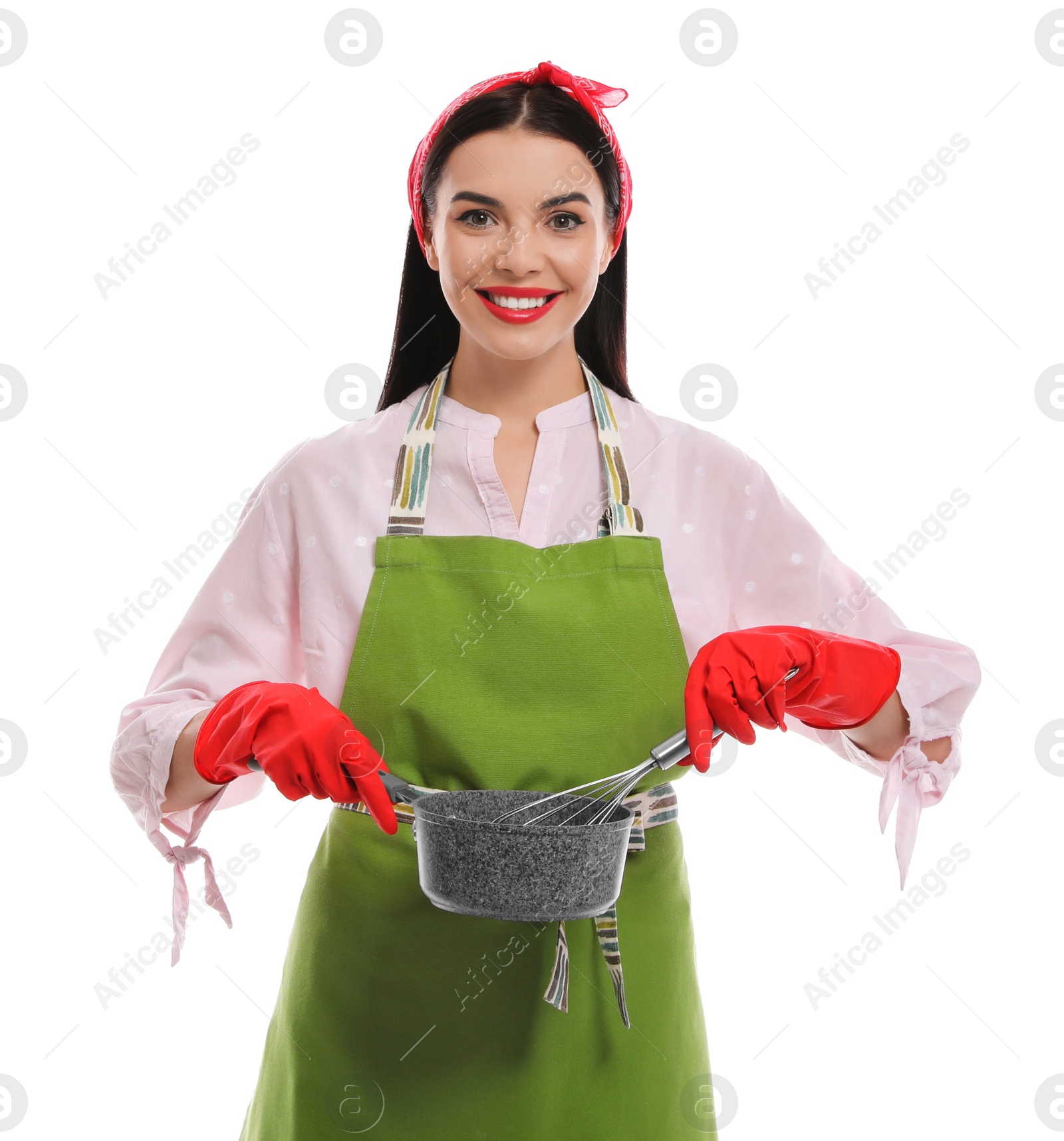 Photo of Young housewife with saucepan and whisk on white background