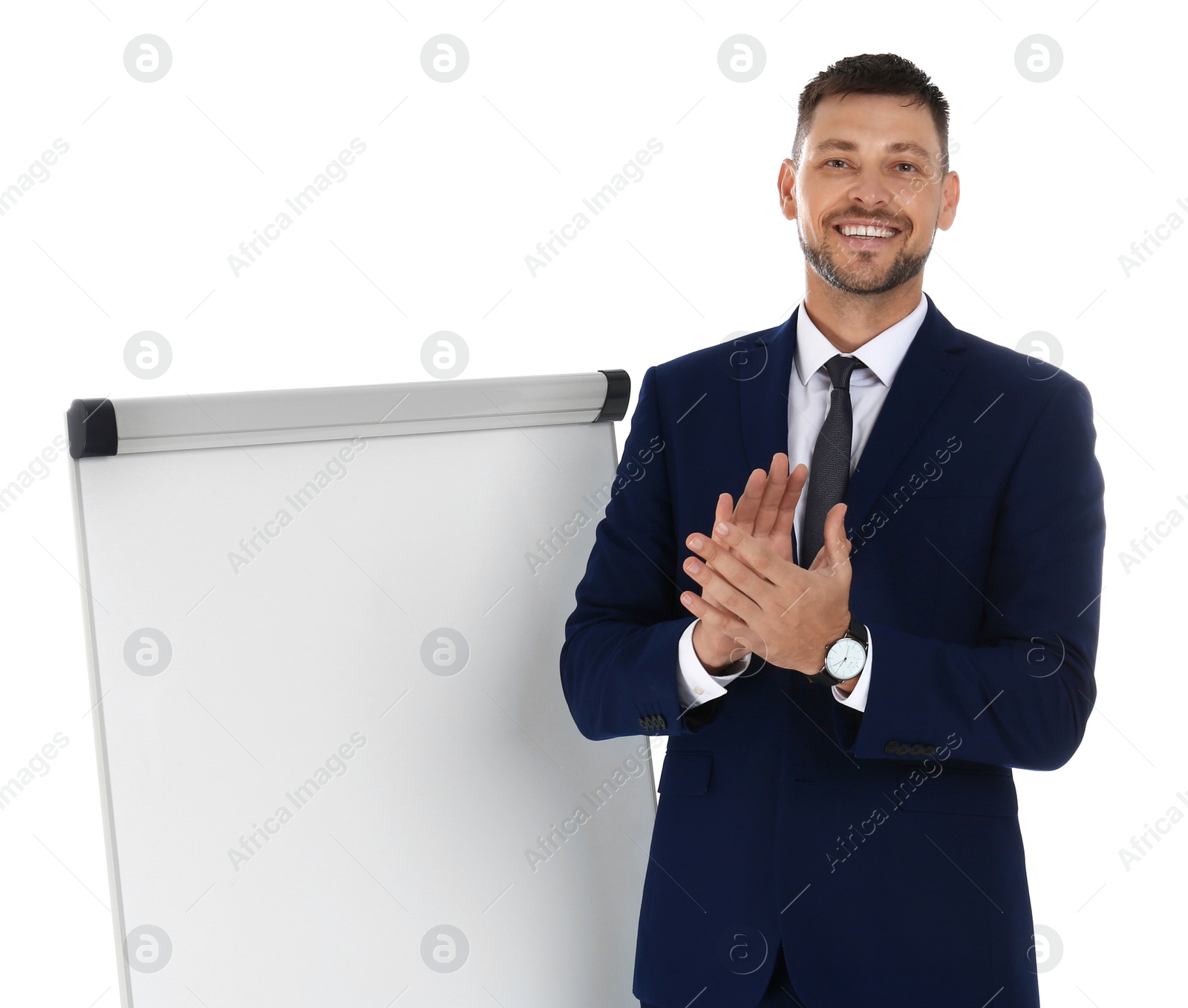 Photo of Professional business trainer near flip chart board on white background. Space for text