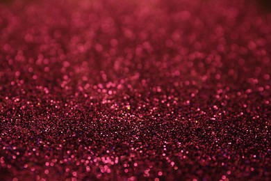 Photo of Shiny pink glitter as background. Bokeh effect