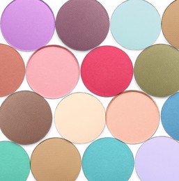 Image of Collage of beautiful different eye shadow refill pans on white background