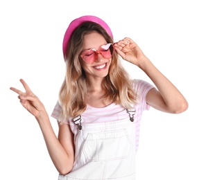 Young beautiful woman wearing heart shaped glasses on white background